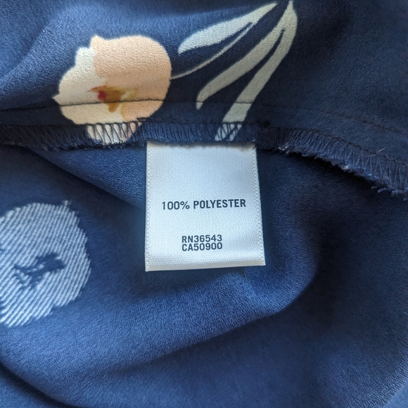 Floral blue with white and red. Size is extra small but easily fits small. - Picture 6 of 6